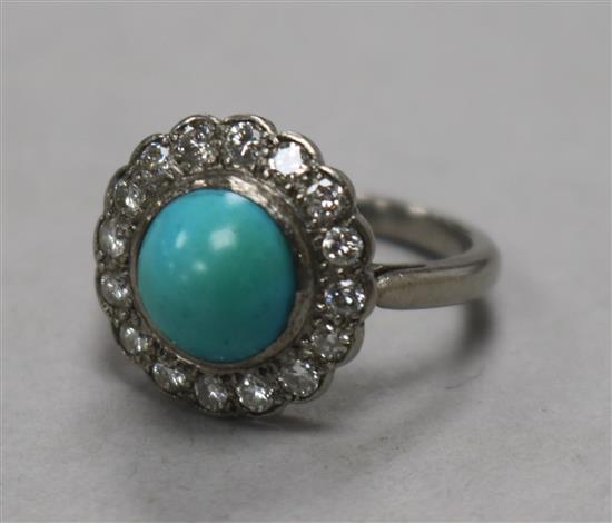 A white metal, turquoise and diamond cluster ring, size L.